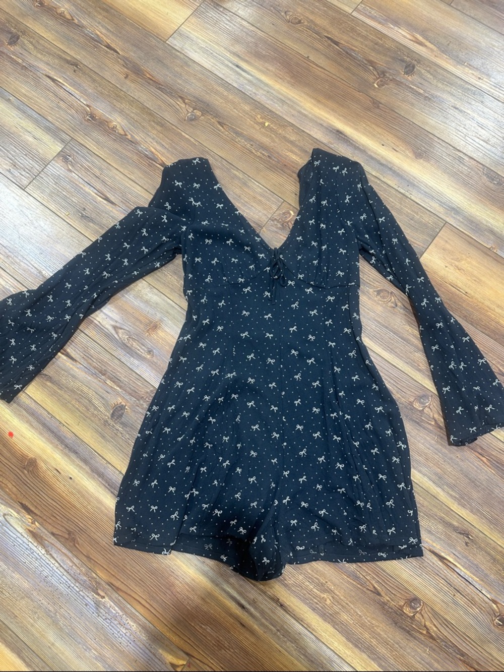 American Eagle Outfitters Black Bow-Print Long-Sleeve One-Piece Romper